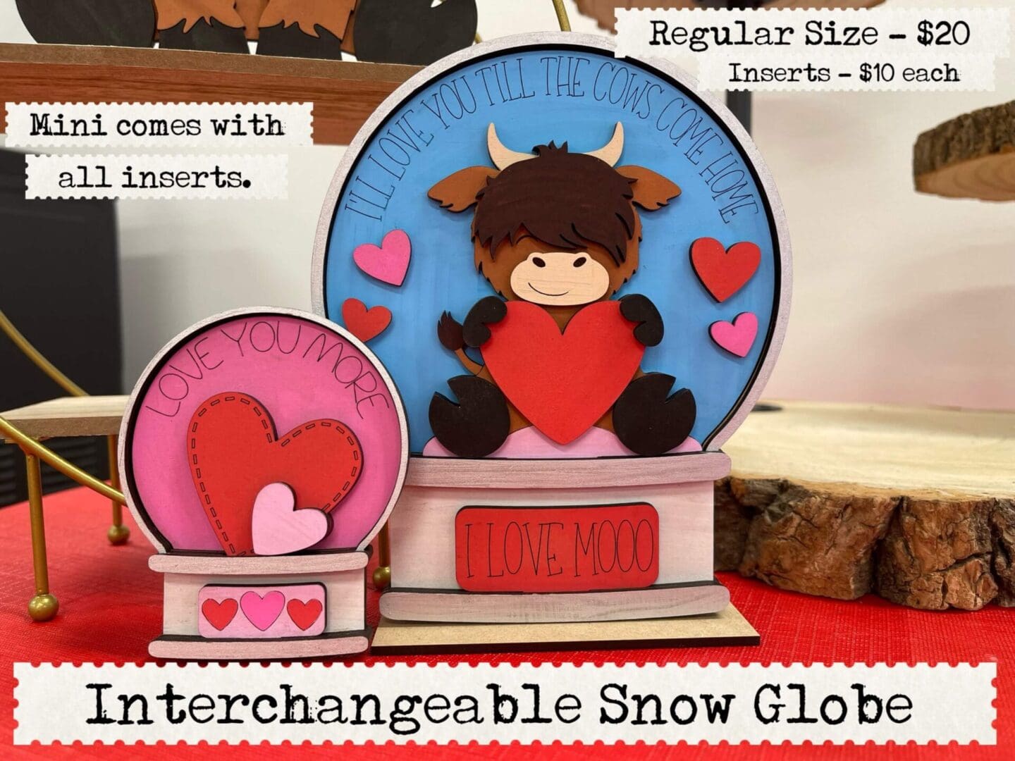 A snow globe with a bull and heart on it.