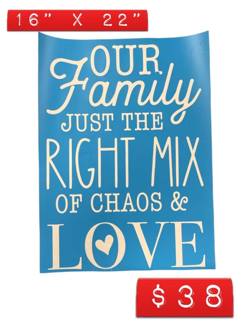 A blue sign with the words " our family just the right mix of chaos & love ".