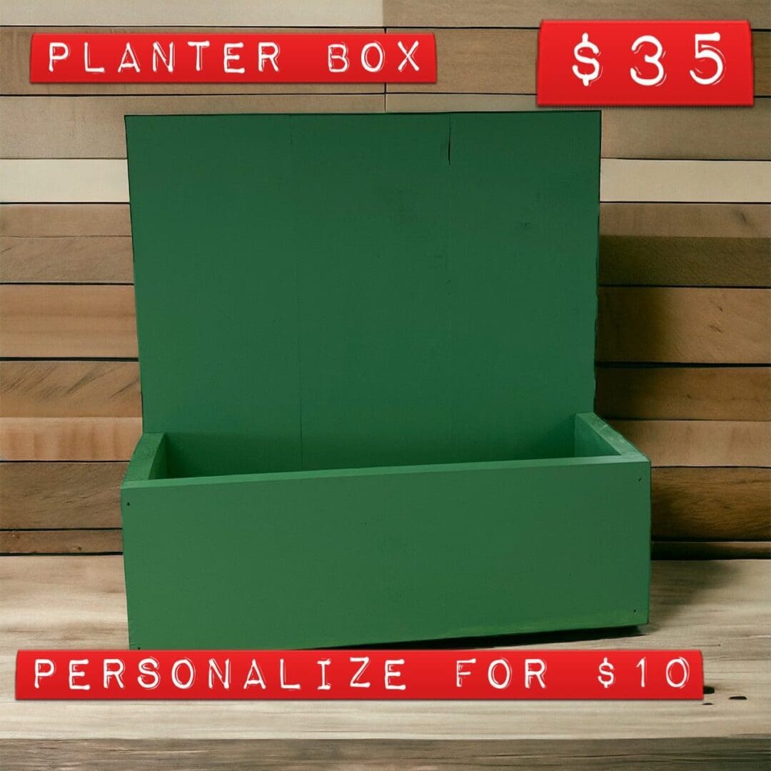 A green box sitting on top of a wooden table.